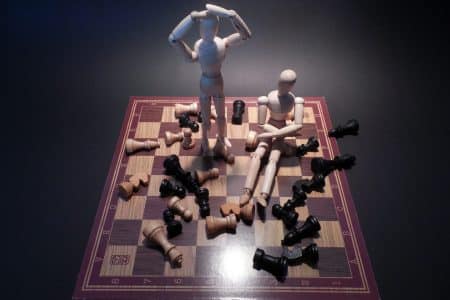 toy soldiers on top of a chessboard