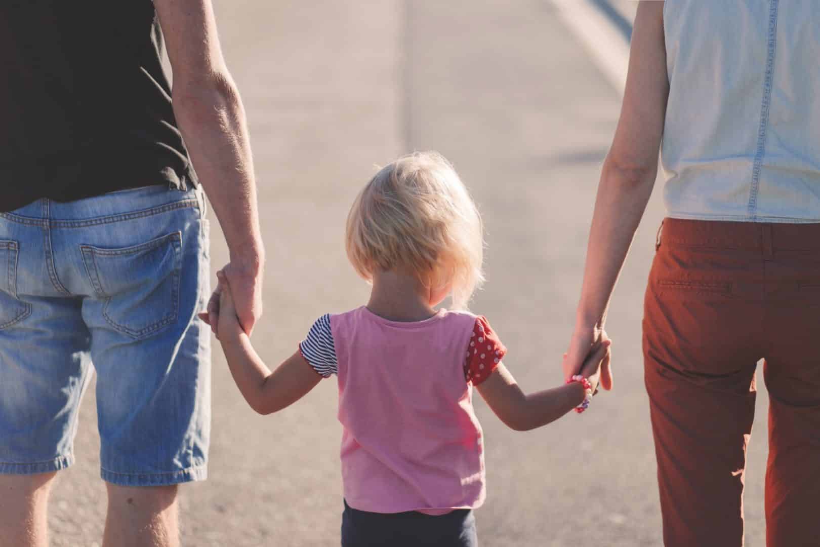 holding parent's hand