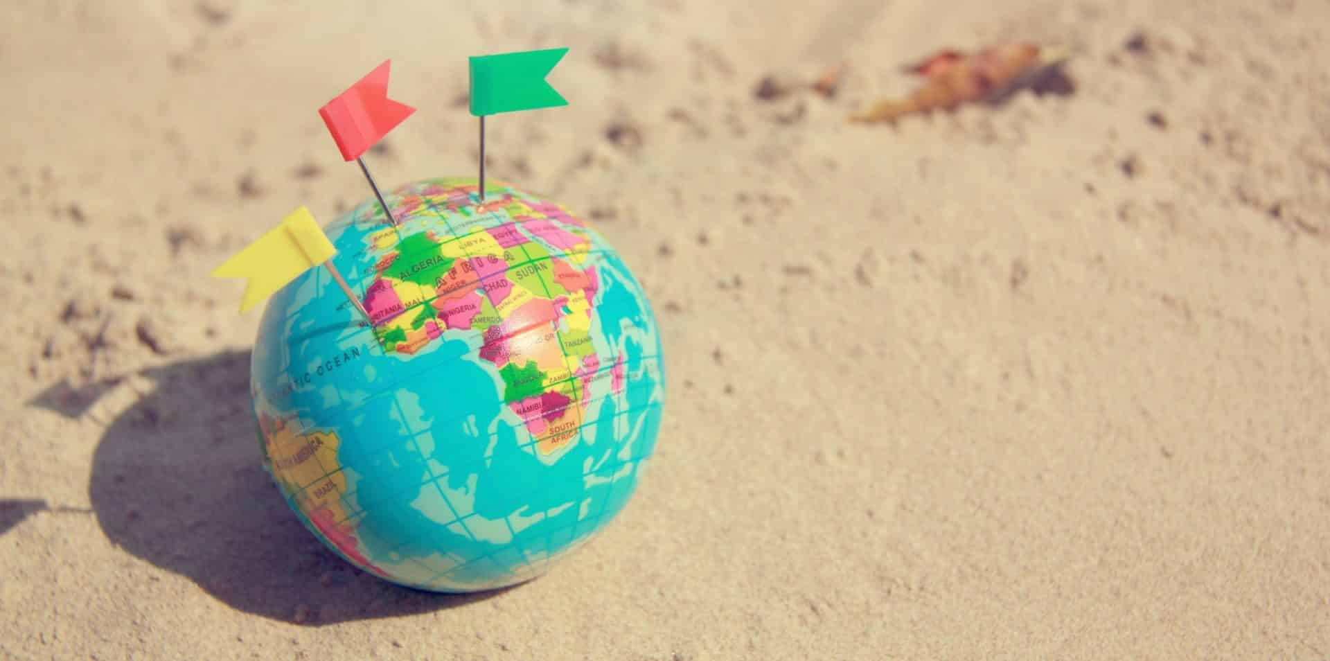 globe on the sand