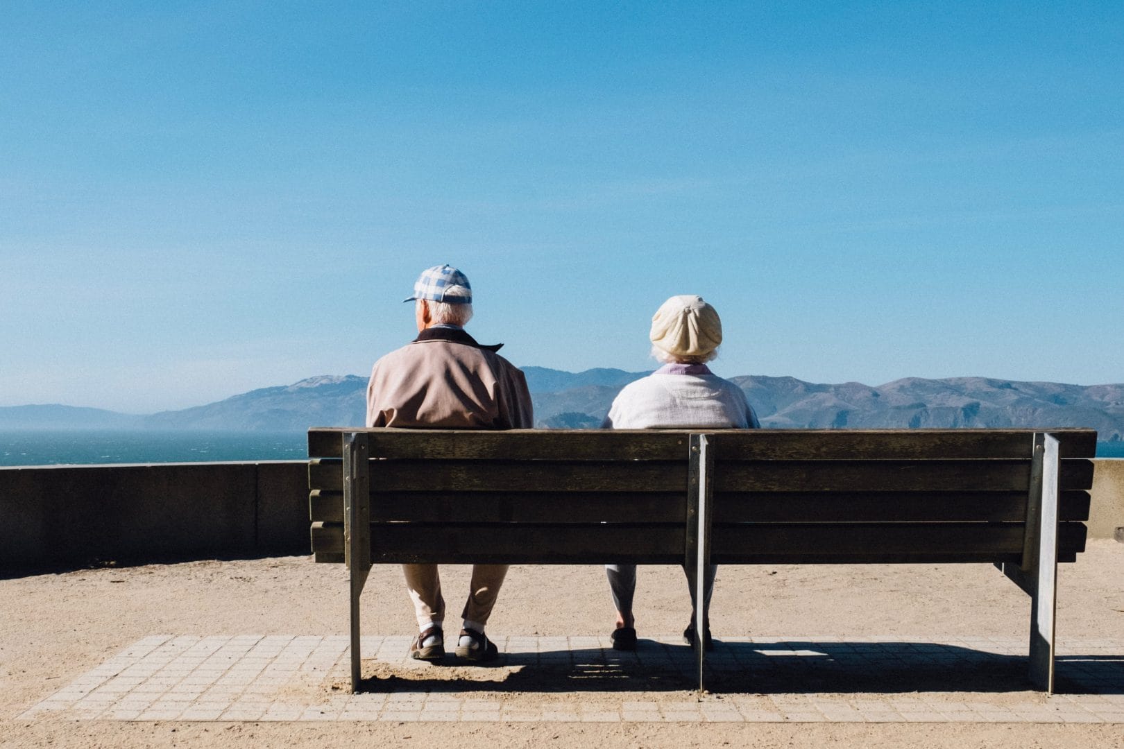 old couple sitting on the bench