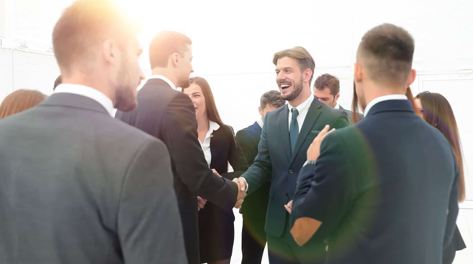 collegues handshaking