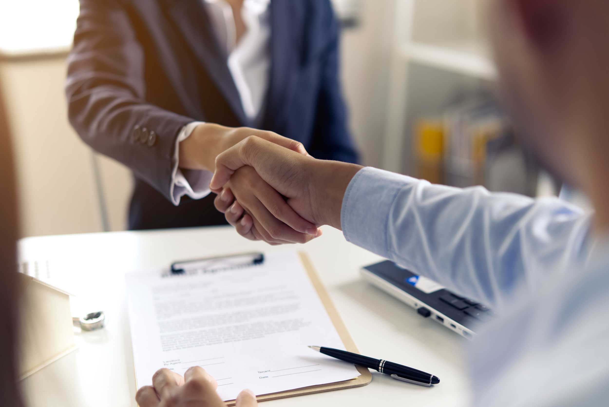 men handshaking